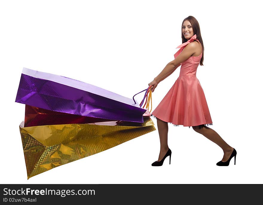 Young woman is drawing large paper bags with purchase. Young woman is drawing large paper bags with purchase