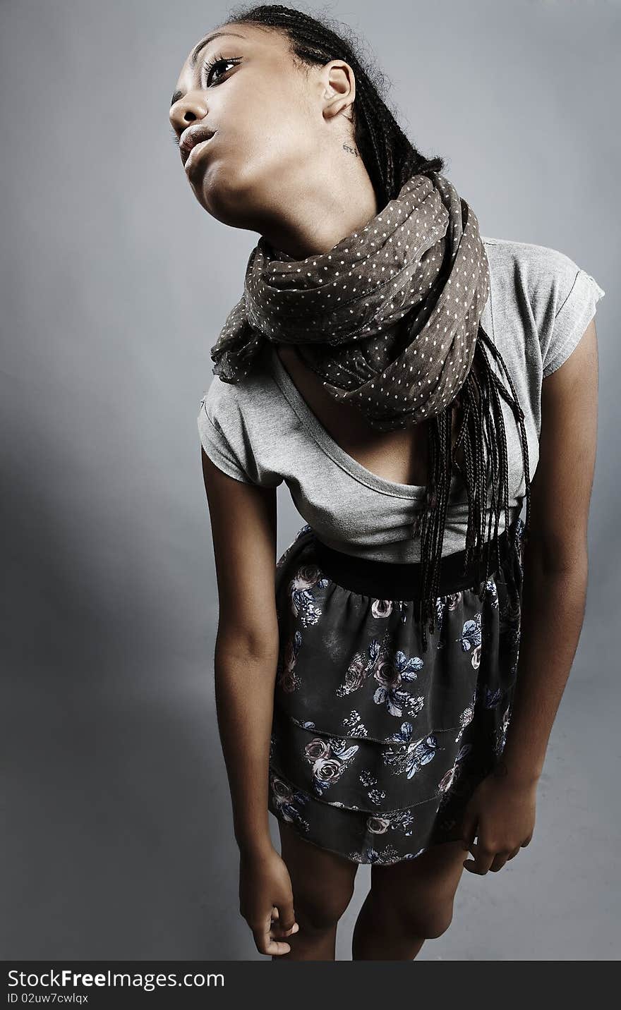 Beautiful African Woman Pose On Grey Background