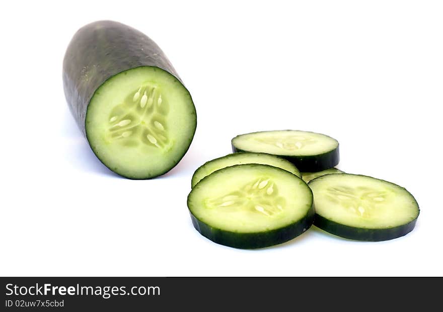 Sliced cucumbers isolated on white background