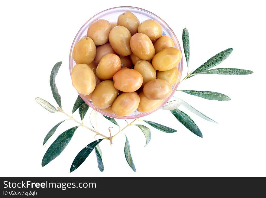 Green olives with leaves isolated on white background