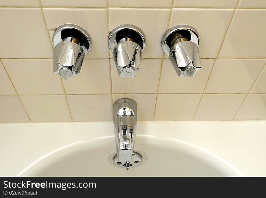 Top view of water tap and knobs