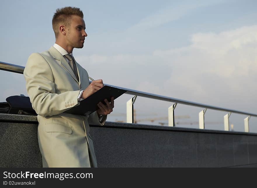 Portrait of businessman on the street