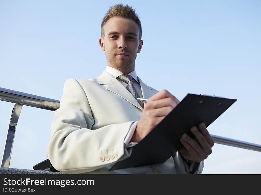 Portrait of businessman on the street