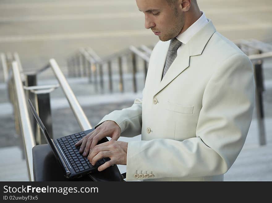 Businessman portrait with laptop