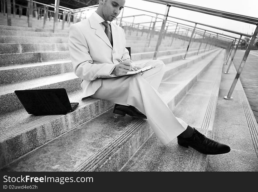 Businessman portrait with laptop