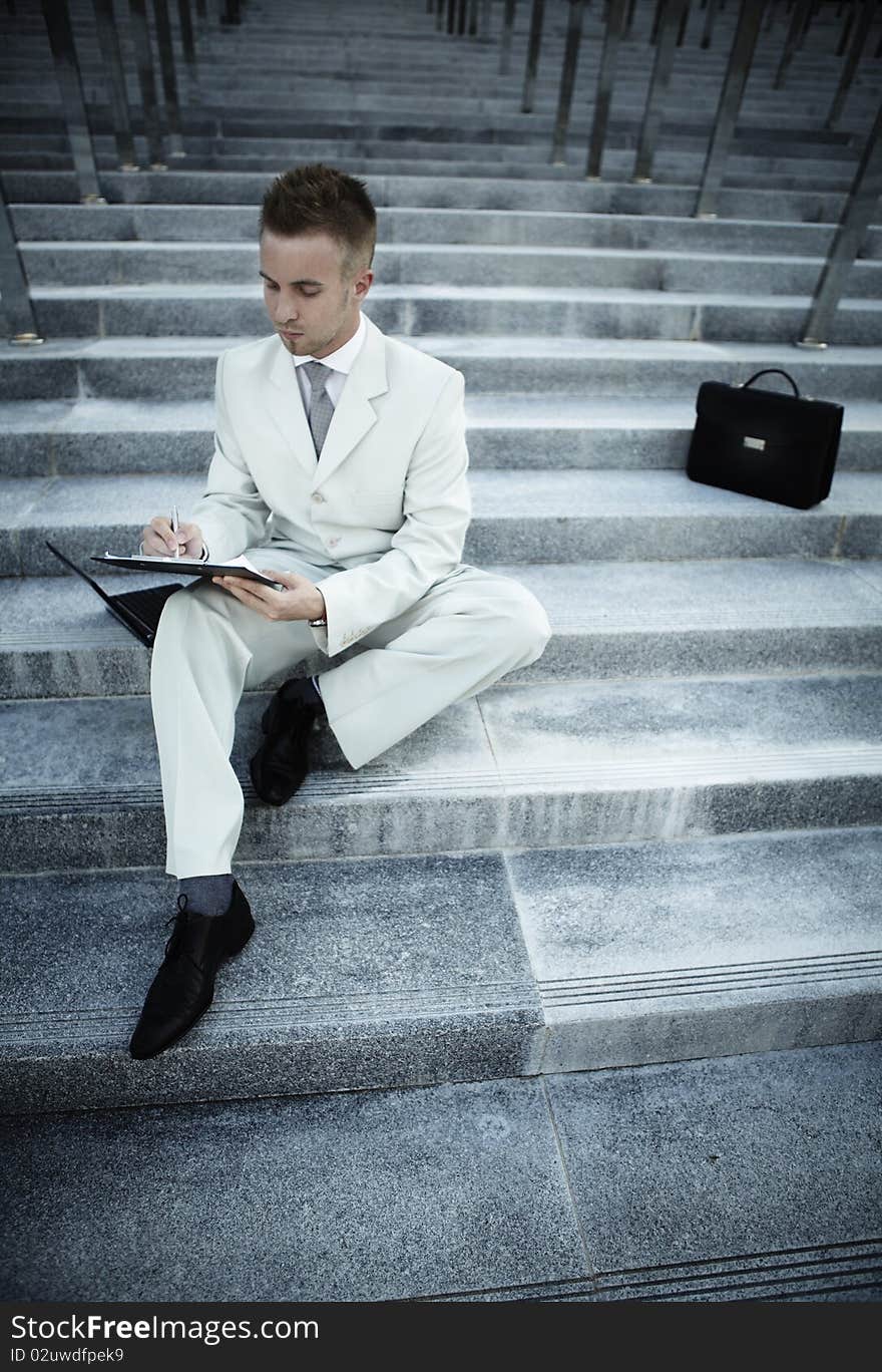 Businessman portrait on stairs