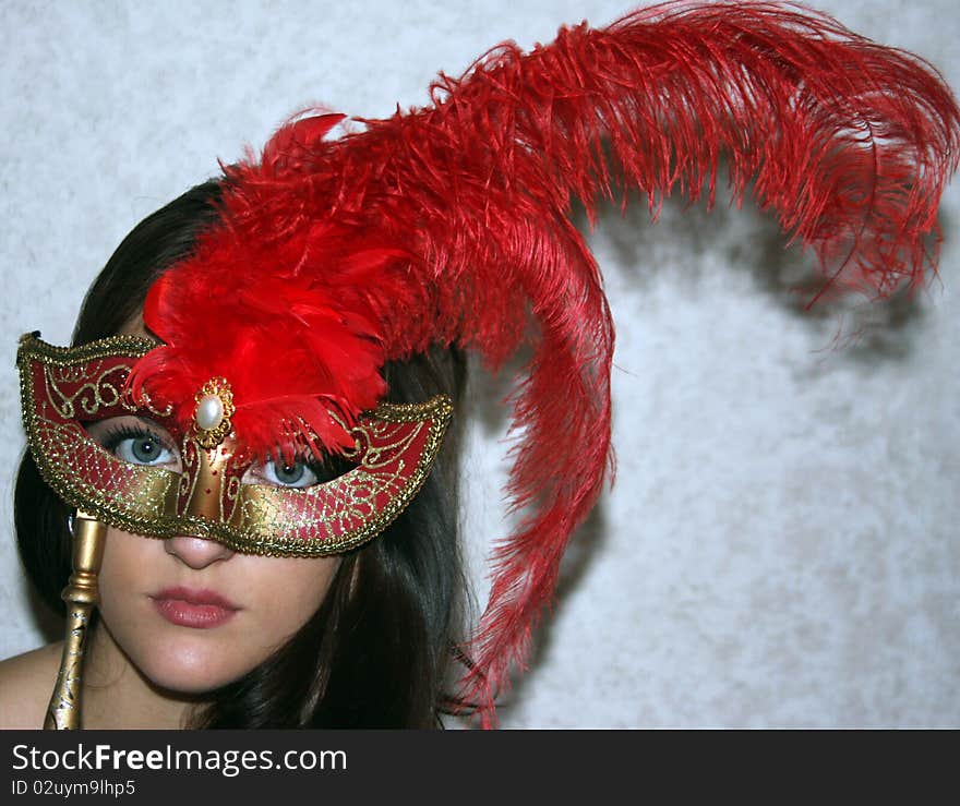 Young girl with red mask