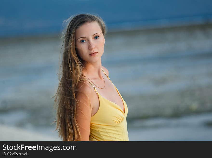 Portrait of naturally beautiful woman in her twenties, shot outside in natural sunlight