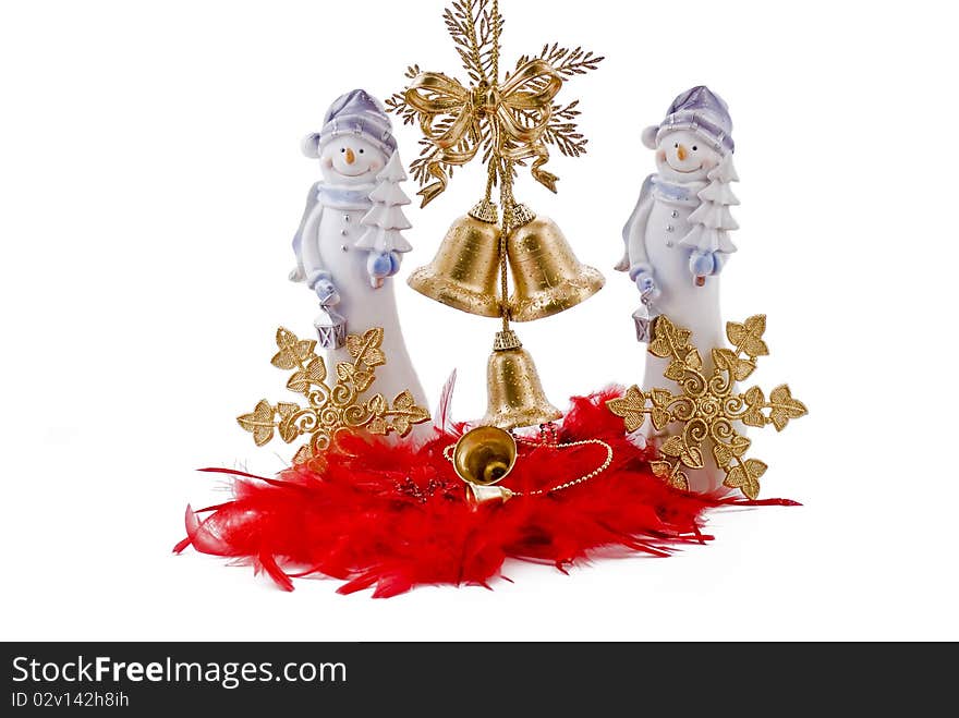 Christmas snowmans with golden bells and golden stars on the red feathers