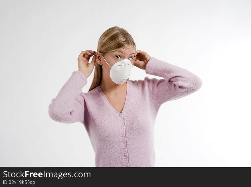 Young woman with protecting mask