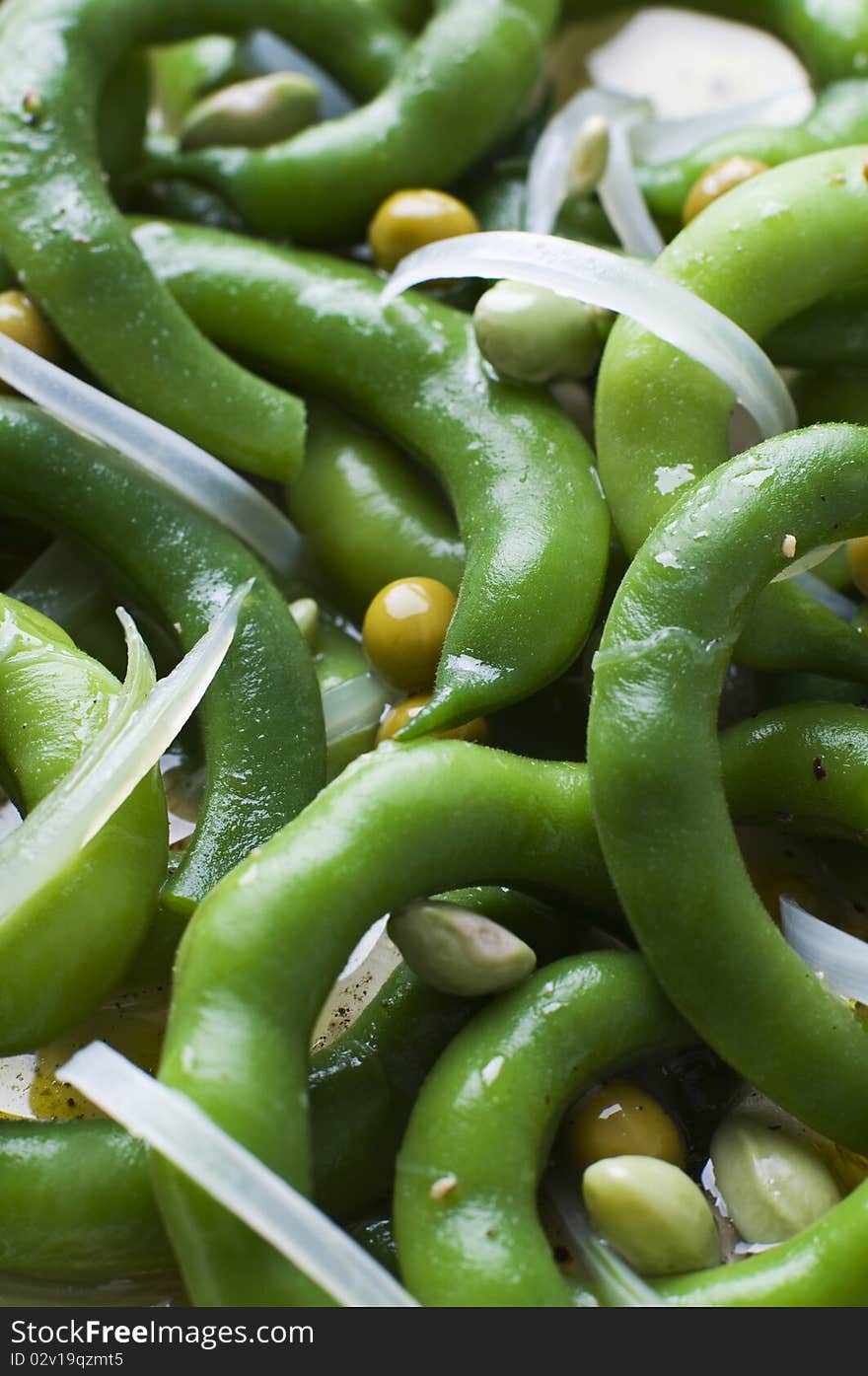 Fresh green bean salad with onion and vinegar close up