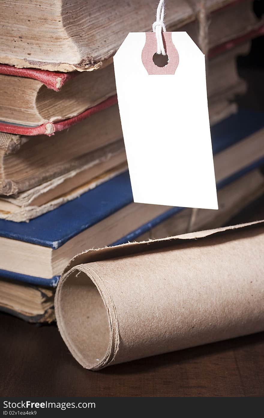 Archival documents in a book-depository are tied up by a cord. Archival documents in a book-depository are tied up by a cord.