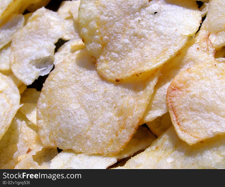 Detail photo of the potatocrisps background. Detail photo of the potatocrisps background