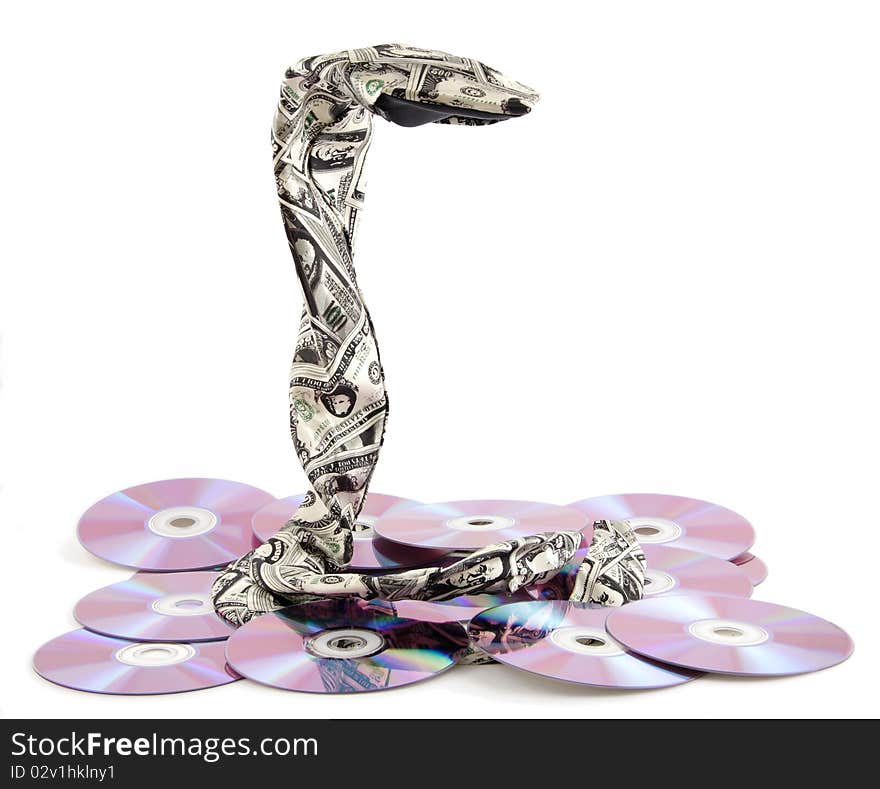 Tie in the form of a snake on a heap dvd disks on a white background. Tie in the form of a snake on a heap dvd disks on a white background