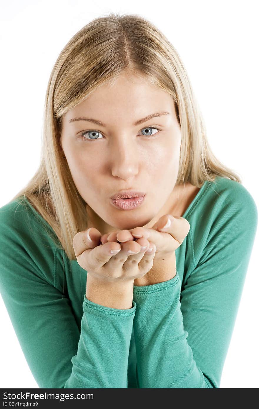 Beautiful teenage girl sends kiss with both hands, isolated on white. Beautiful teenage girl sends kiss with both hands, isolated on white