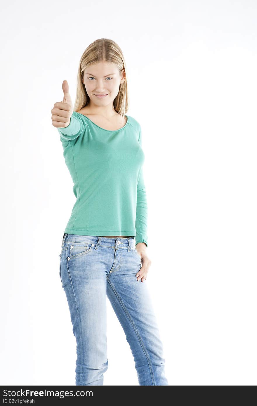 Beautiful teenage girl with thumbs-up, isolated on white