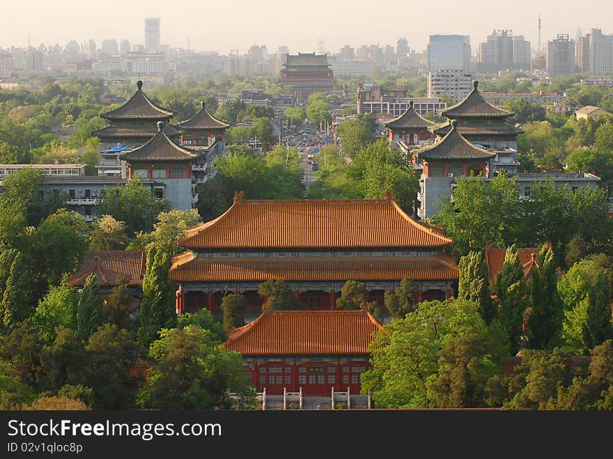 Forbidden city is surrounded by modern buildings. Forbidden city is surrounded by modern buildings.