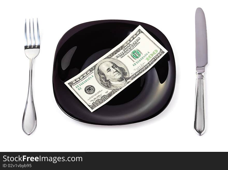 Banknote On A Black Plate With Knife And Fork