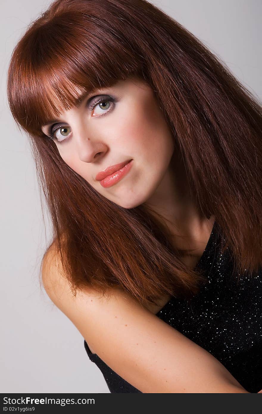 Closeup portrait of a beautiful red-haired woman