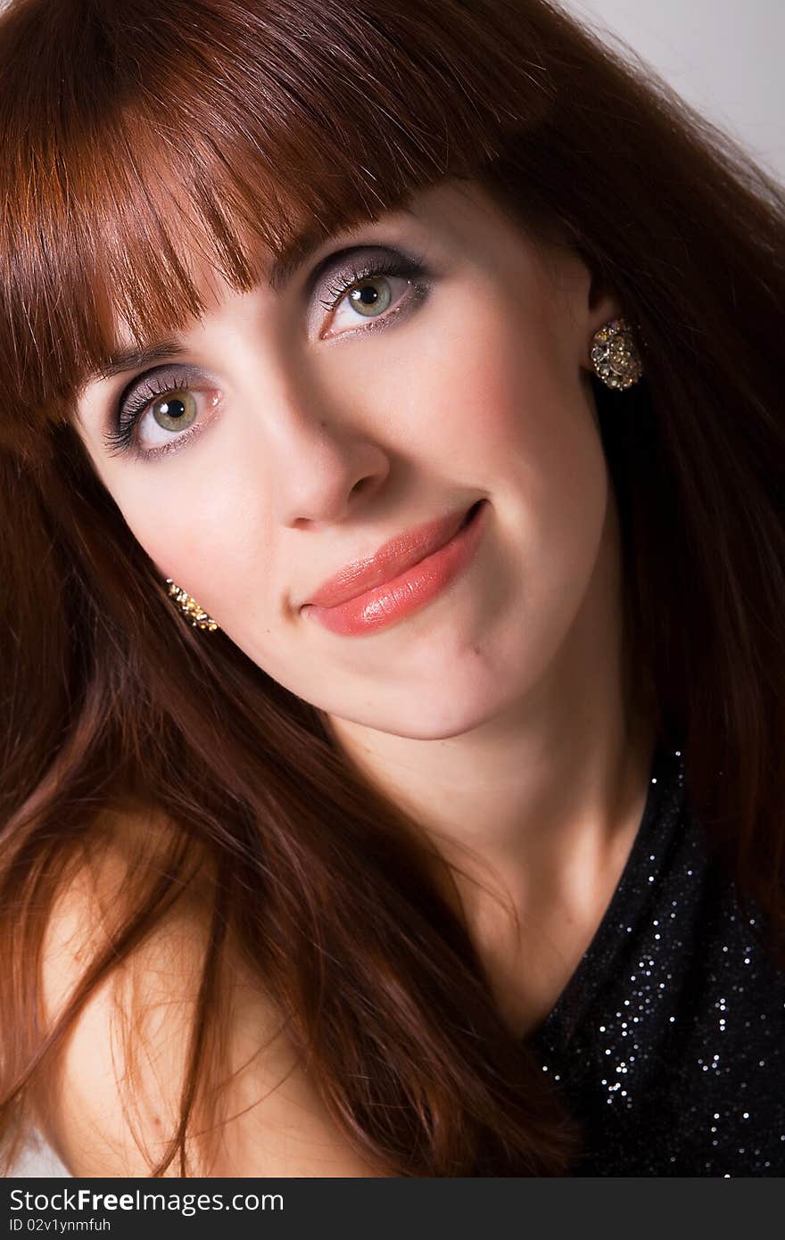 Closeup portrait of a beautiful red-haired woman