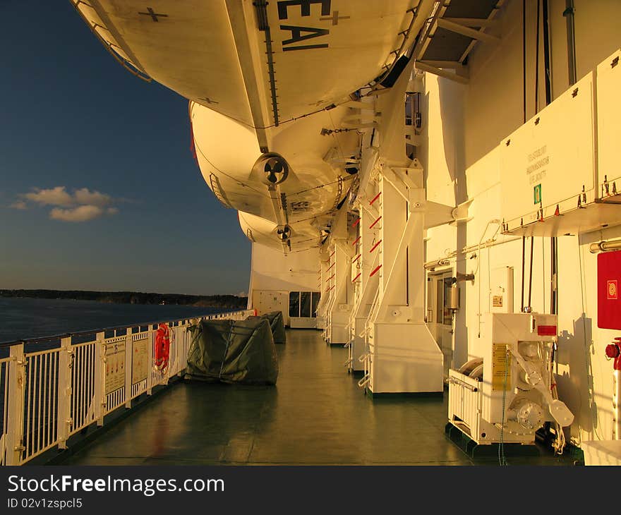 Ship - Life boats on ship by sunset