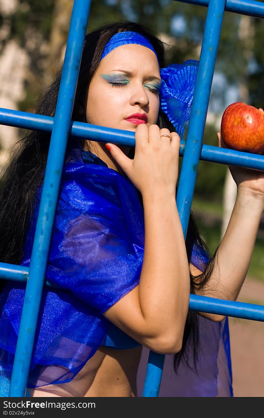 Beautiful girl in a blue dress