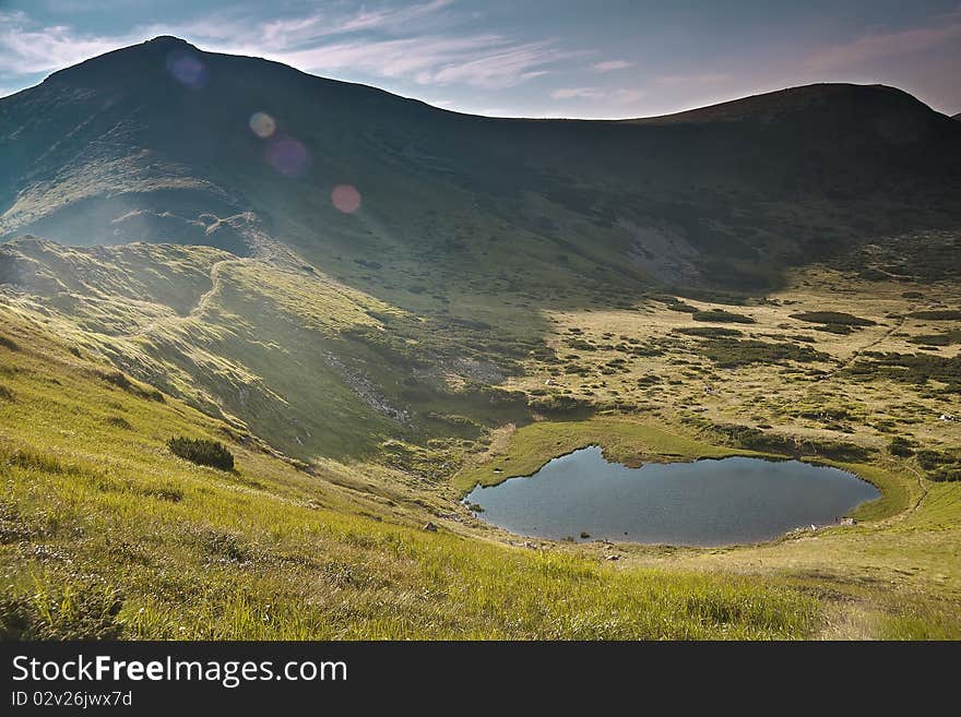 Lake in Carpatian mountains in the evening. Lake in Carpatian mountains in the evening