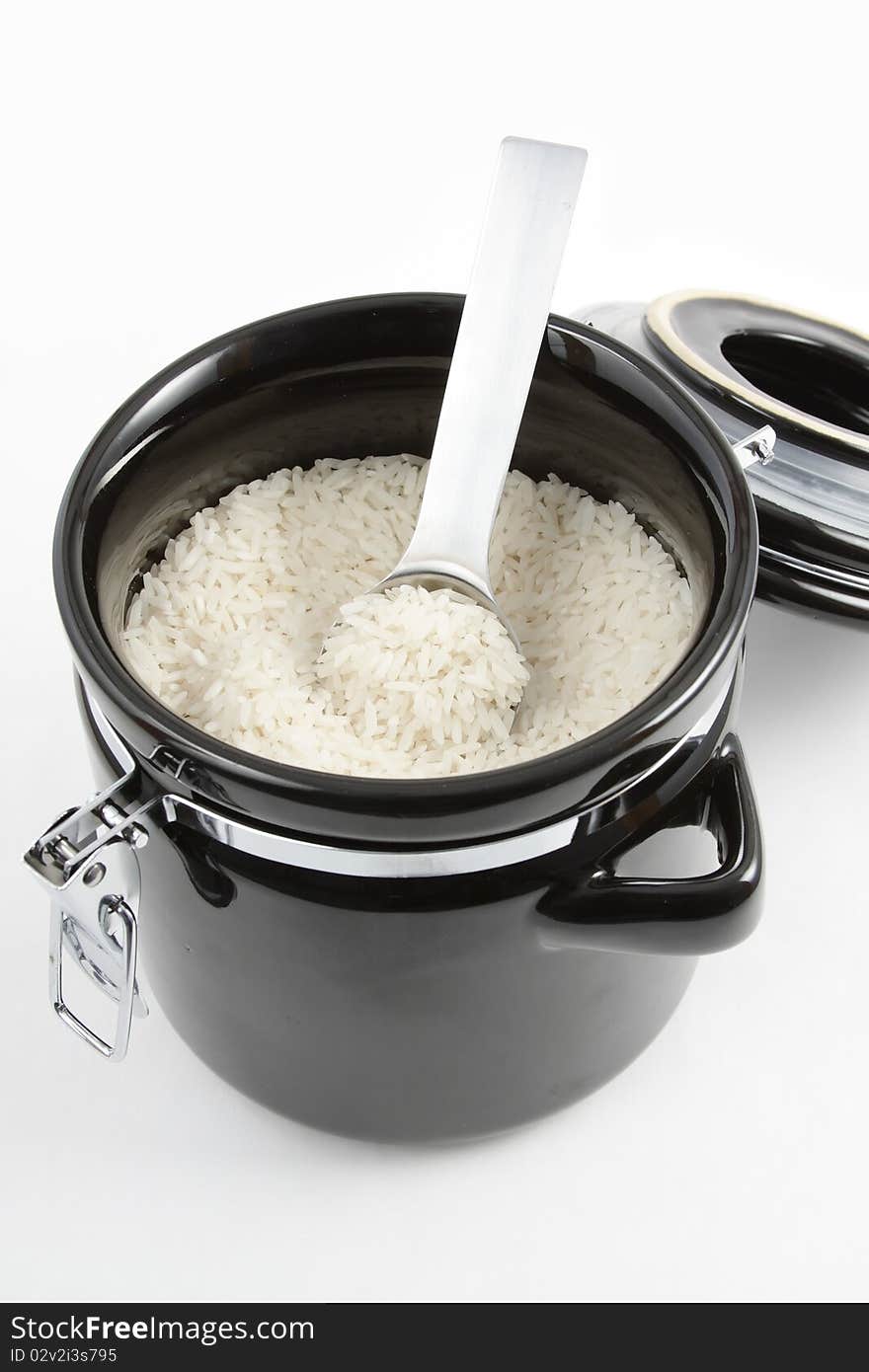 Ceramic storage container with rice in it