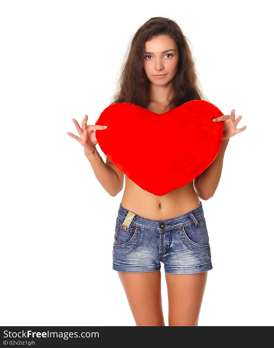 Young smiling woman with red heart symbol, isolated. Young smiling woman with red heart symbol, isolated