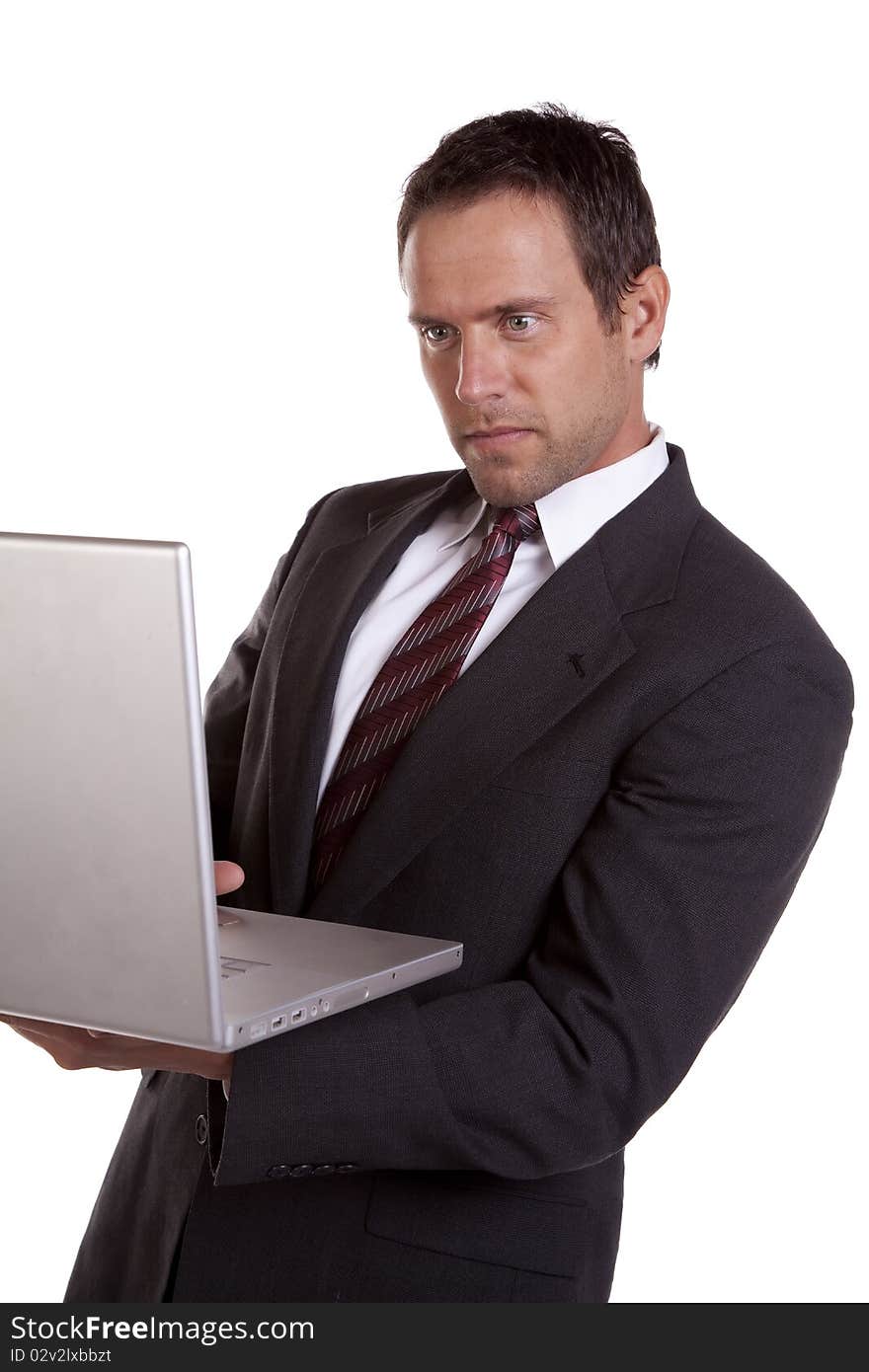 Man looking at laptop studying