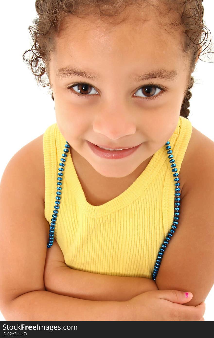 Adorable three year old hispanic-african american girl close up.