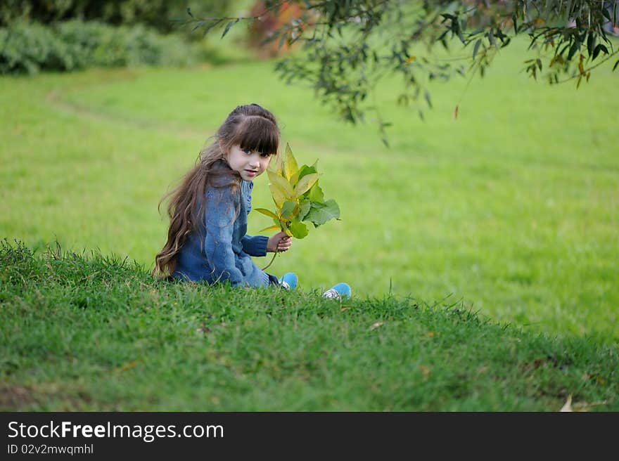 Adorable small girl on the hill