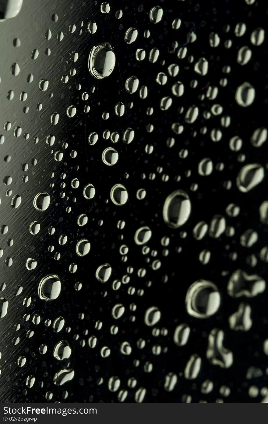 Water Droplets on a metal Surface. Abstract background