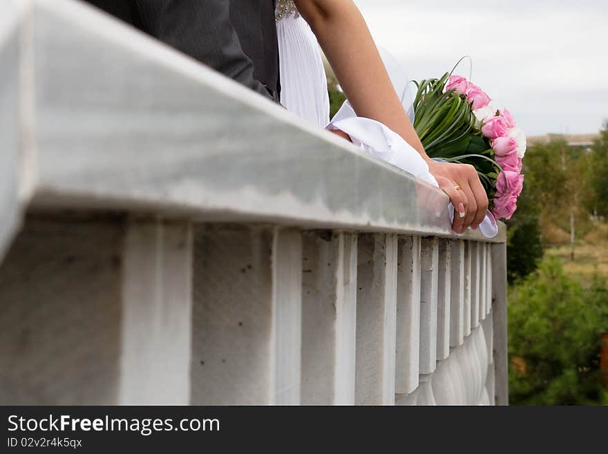 Bride and groom joined their hands. Bride and groom joined their hands