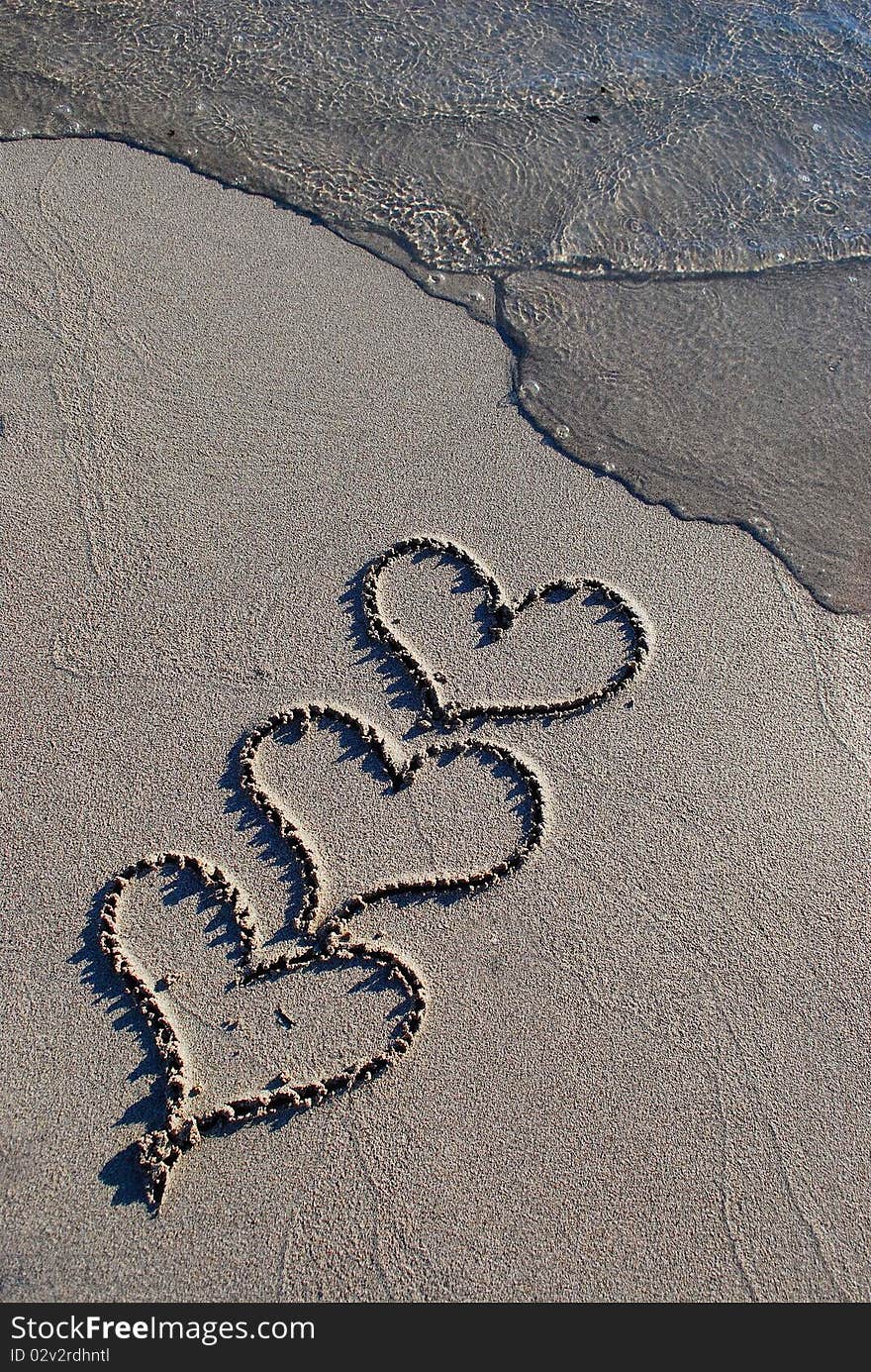 This three hearts were drawn in the sand on the beach of las Salinas, in the Mediterranean island of Ibiza.