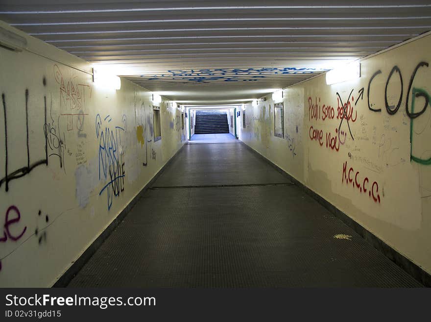 Pedestrian underpass with graffiti on the walls