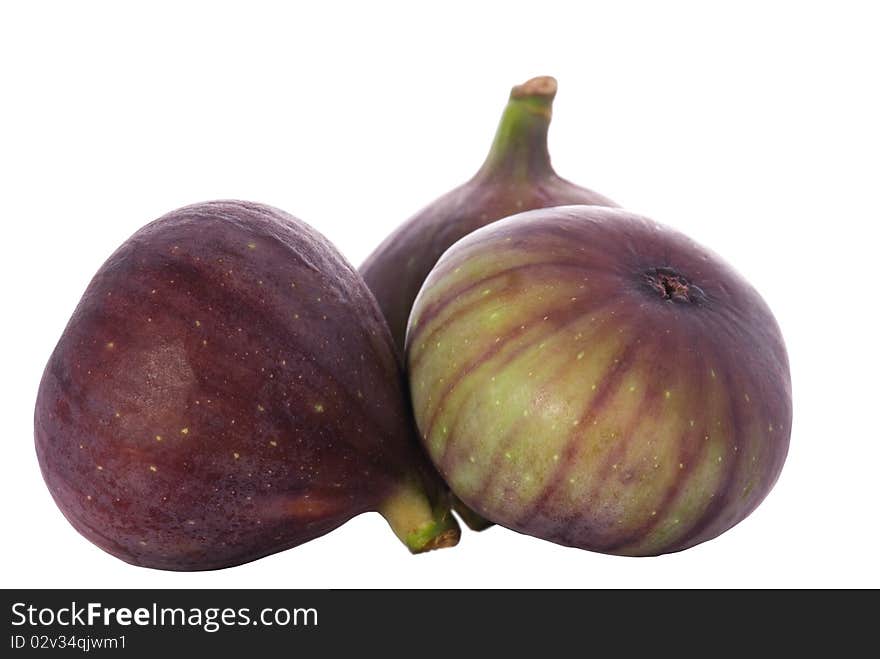 Three figs isolated on white