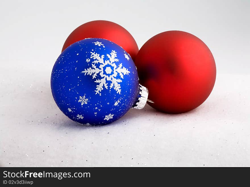 Christmas ornaments on white snow. Christmas ornaments on white snow