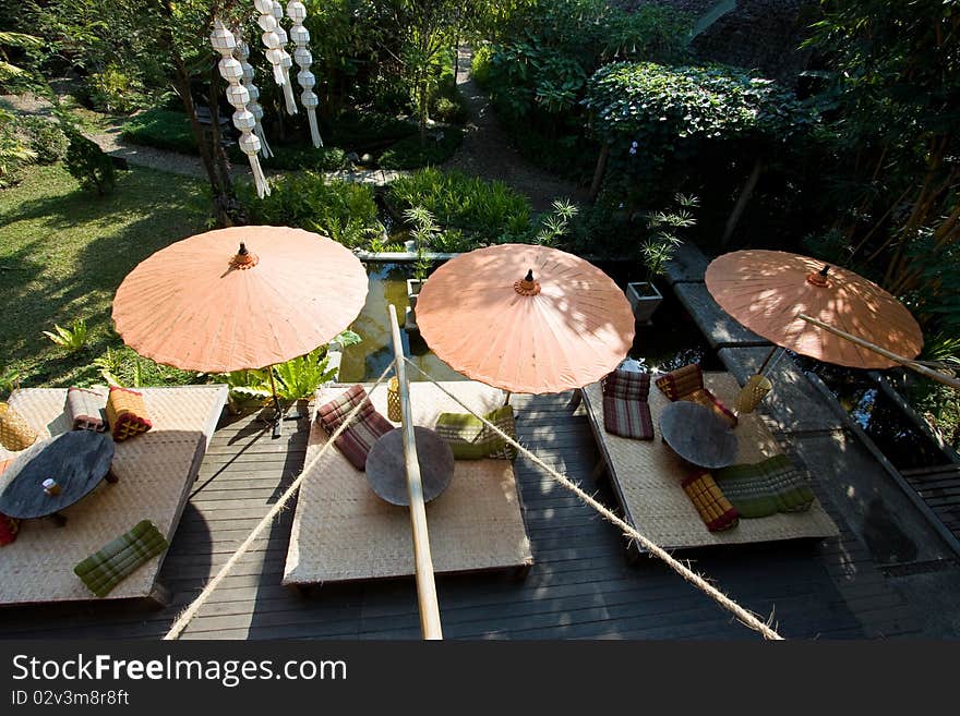 The stool under umbrella for relaxation