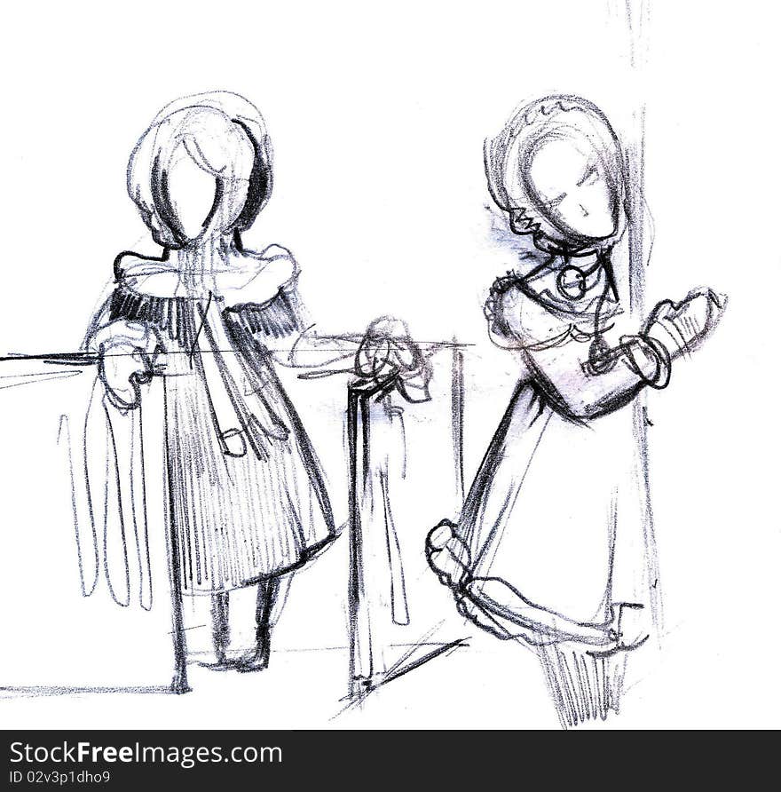 Picture of two girls in his coat on the street at the gate. Picture of two girls in his coat on the street at the gate