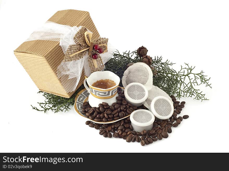 Cup of espresso coffee pods and coffee beans on white background. Cup of espresso coffee pods and coffee beans on white background