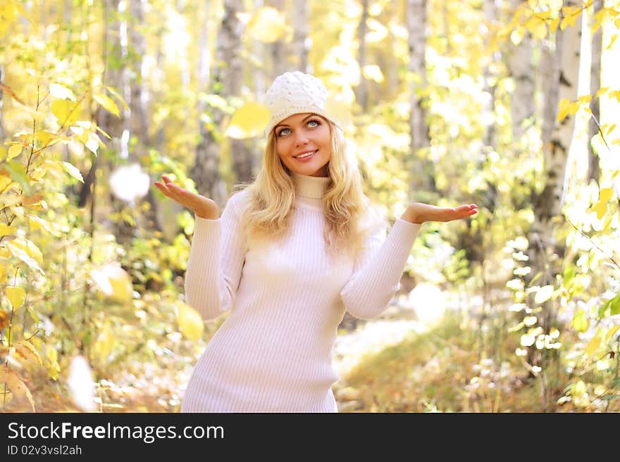 Girl in the autumn forest