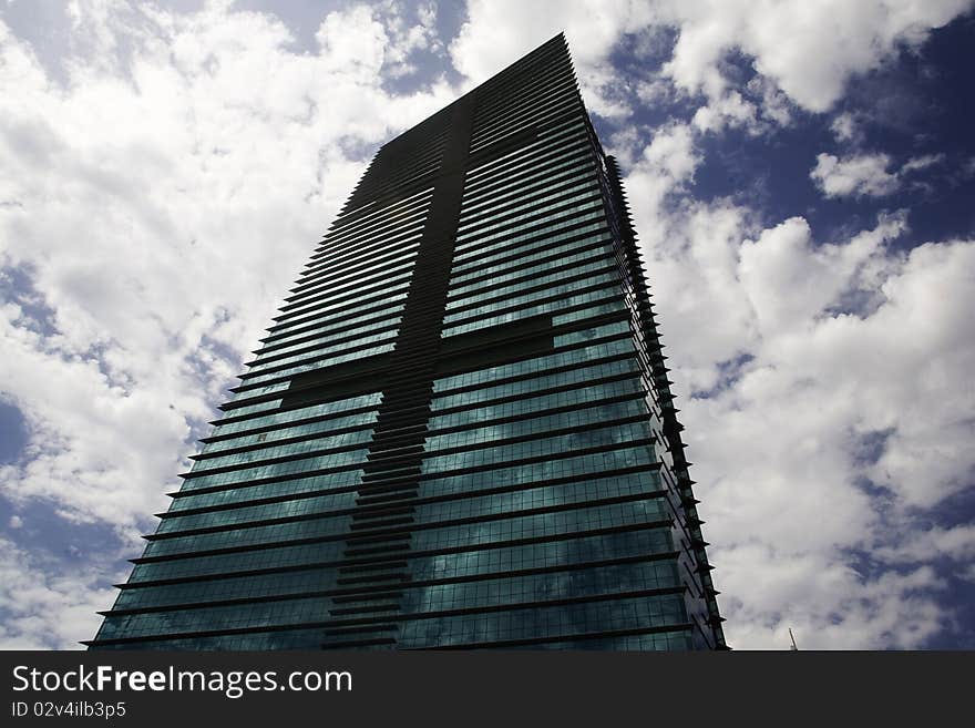 Skyscraper in the sky with clouds. Skyscraper in the sky with clouds