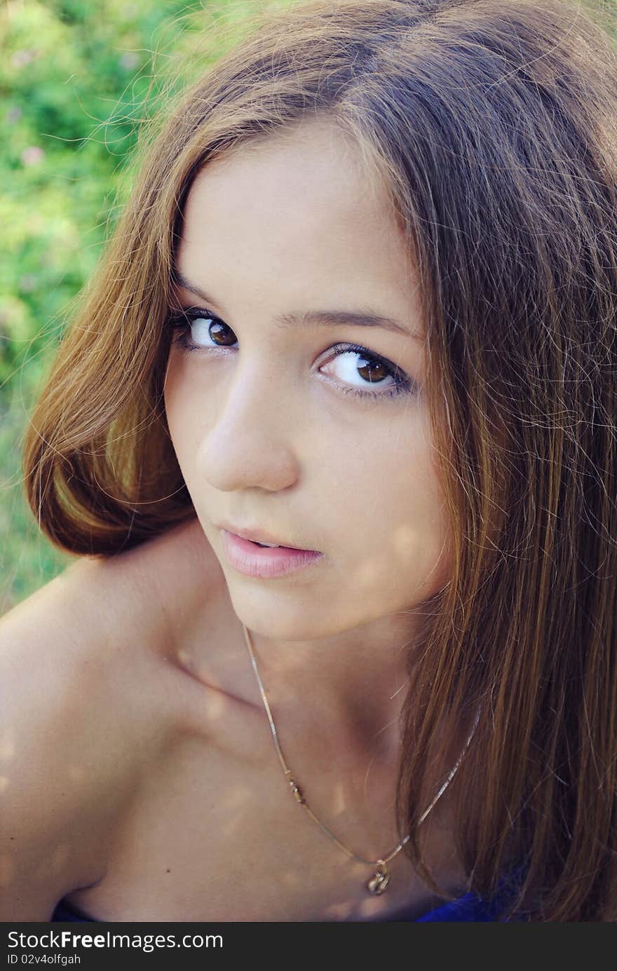 Beautiful Thin Girl With Long Hair And Brown Eyes