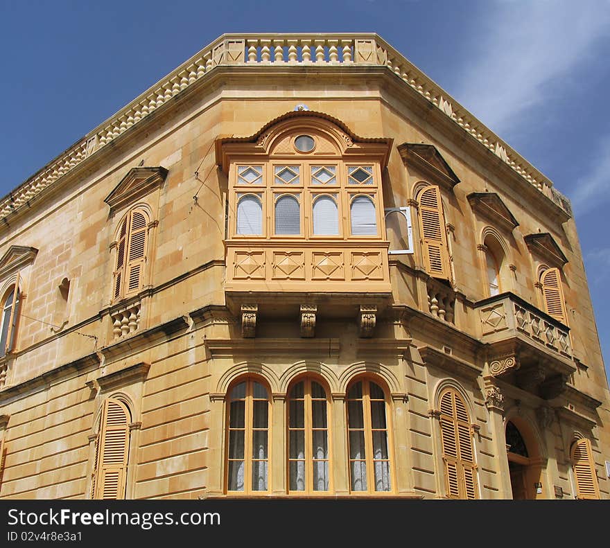 Typical maltese house with balcony