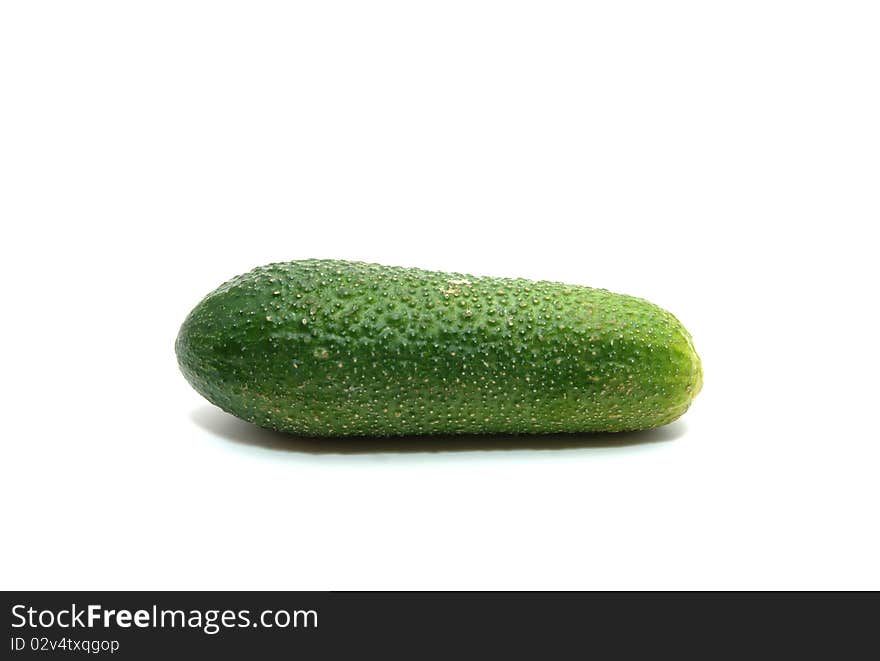 Single whole cucumber on white background. Single whole cucumber on white background.