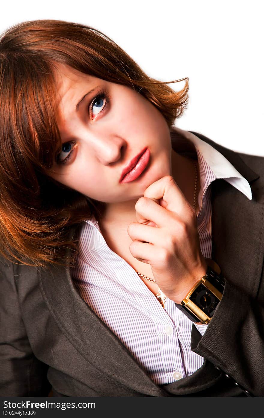 Girl dreaming away and isolated over a white background