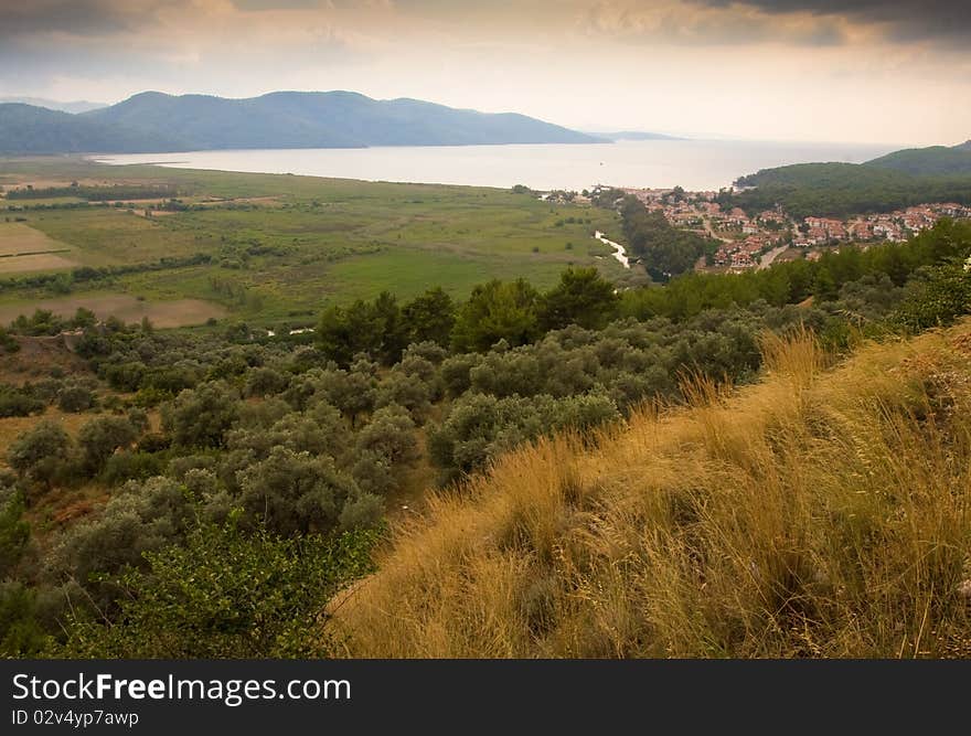 The city by the sea and the mountains in the haze. Turkey