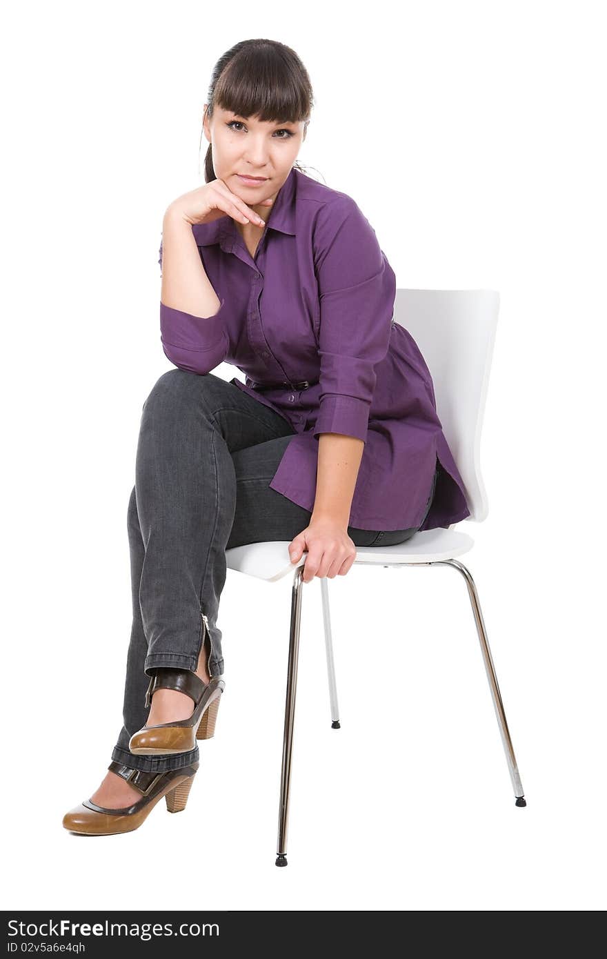 Young adult woman sitting on chair. over white background. Young adult woman sitting on chair. over white background