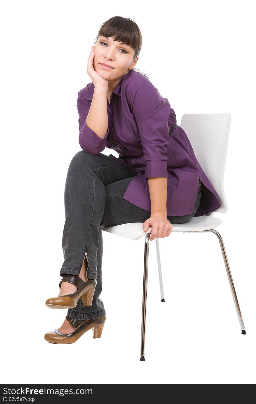 Young adult woman sitting on chair. over white background. Young adult woman sitting on chair. over white background